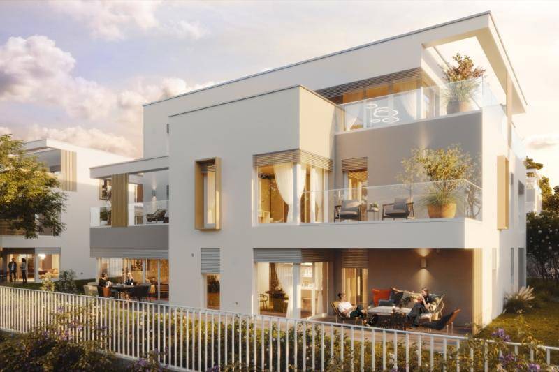 Rendering einer der Neubauten. An den Ecken des quadratischen Grundriss sind Terrassen und Balkone. Die Fassaden sind weiß verputzt, große Fenster mit Jalousien. Flachdach auf dem Gebäude. Rendering einer der Neubauten. An den Ecken des quadratischen Grundriss sind Terrassen und Balkone. Die Fassaden sind weiß verputzt, große Fenster mit Jalousien. Flachdach auf dem Gebäude.